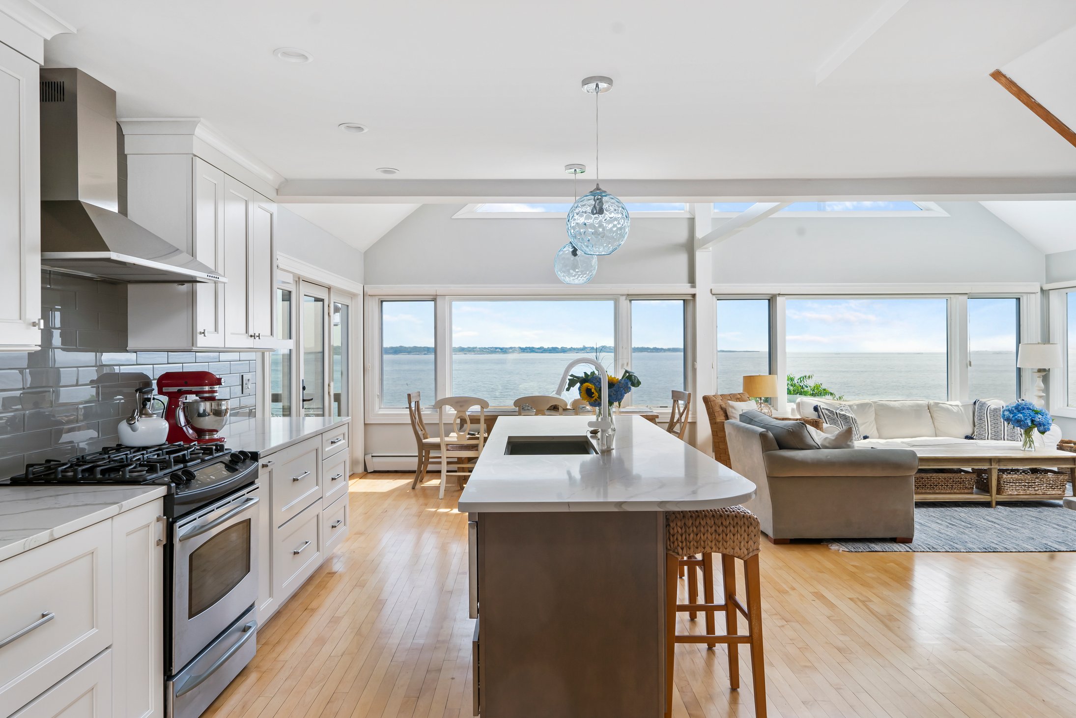Light Coastal Contemporary Kitchen Remodel by Kitchen & Countertop Center of New England project photo